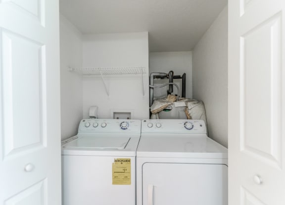 a washer and dryer in the laundry room