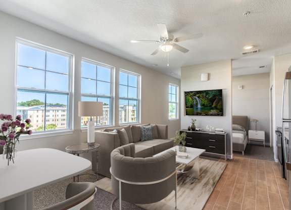 a living room with a couch and a table