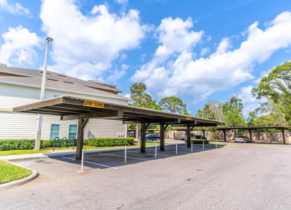 covered parking in front of a building