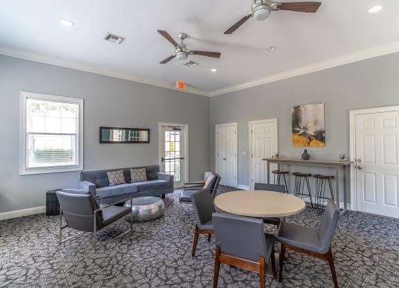 clubhouse area with couches and tv