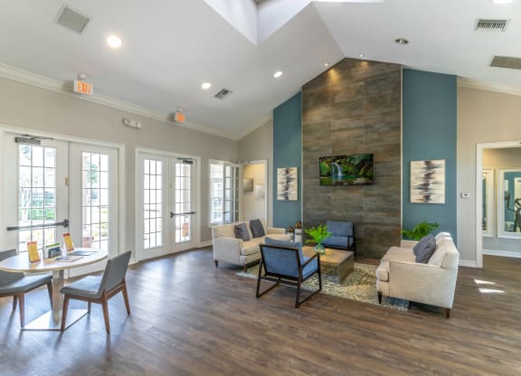 clubhouse area with couches and tv