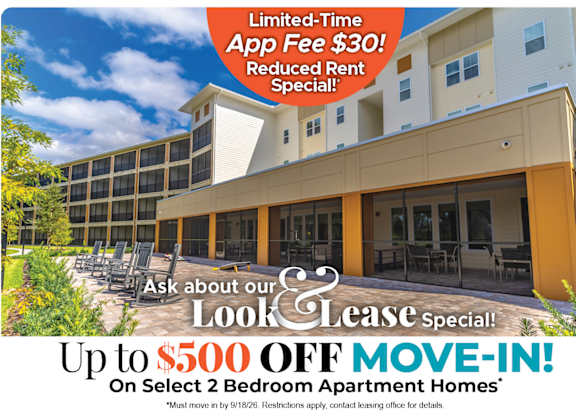 A building advertisement for a lease special offering up to $500 off on select 2 bedroom apartment homes.