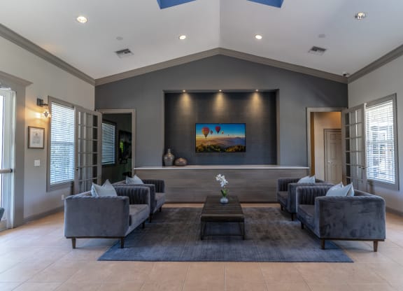 a large living room with couches and a coffee table