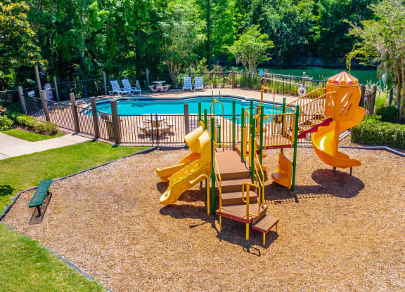 our apartments showcase a swimming pool with nearby playground
