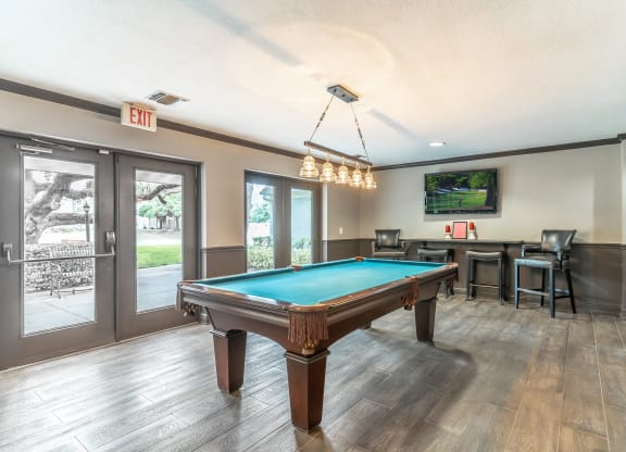 Clubhouse area with pool table and tv