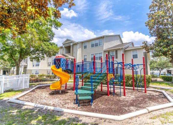 the playground at the whispering winds apartments in pearland, tx