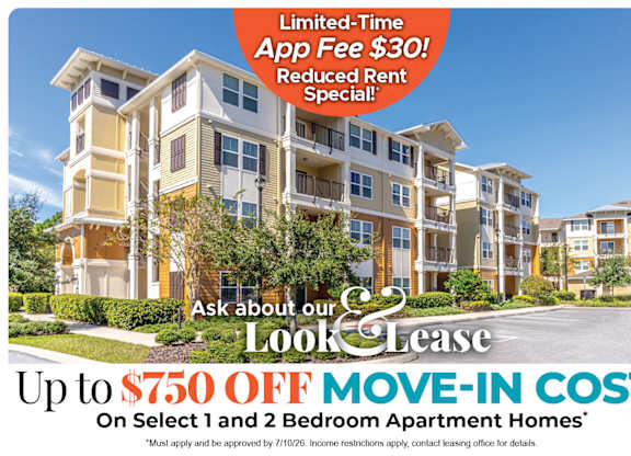 A large apartment complex advertises a limited-time app fee reduction and a move-in cost discount.