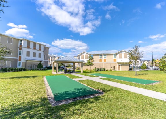 a gazebo and bocce ball court area