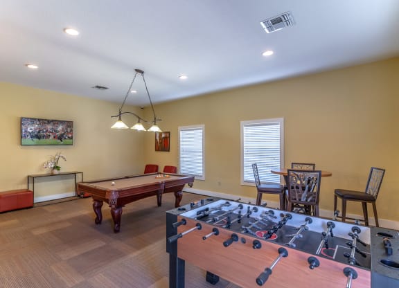 Clubhouse area with pool table and table top soccer
