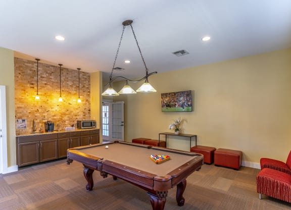Clubhouse with pool table and tv