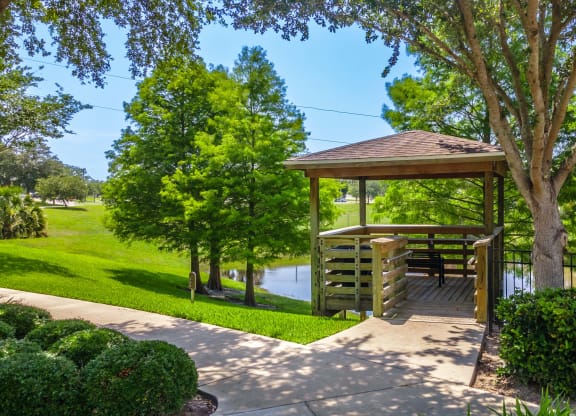 a gazebo at the whispering winds apartments in pearland, tx