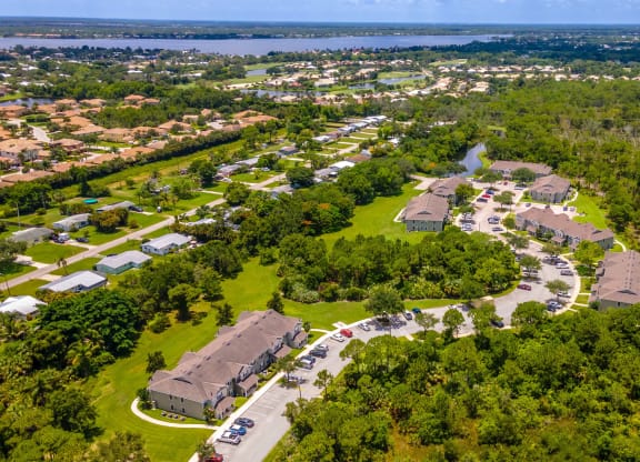 an aerial view of a neighborhood with houses and trees