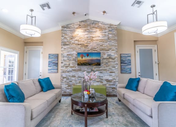 clubhouse area with couches and tv