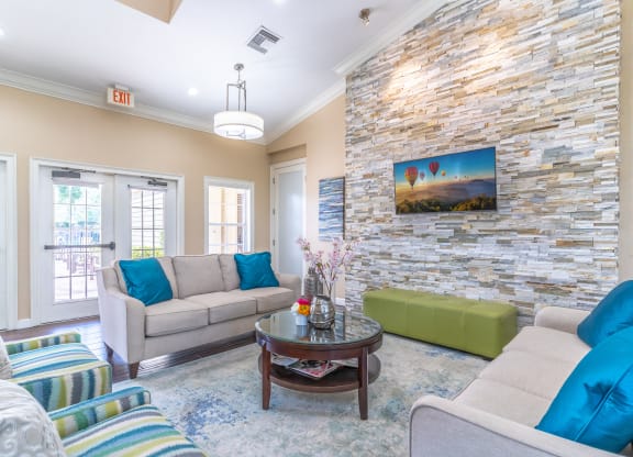 clubhouse area with couches and tv