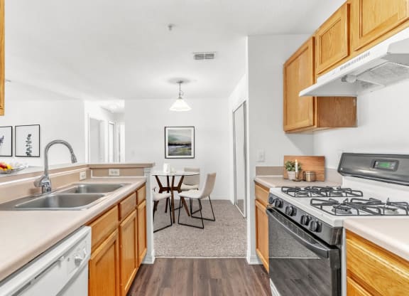 a kitchen and dining area in a 555 waverly unit