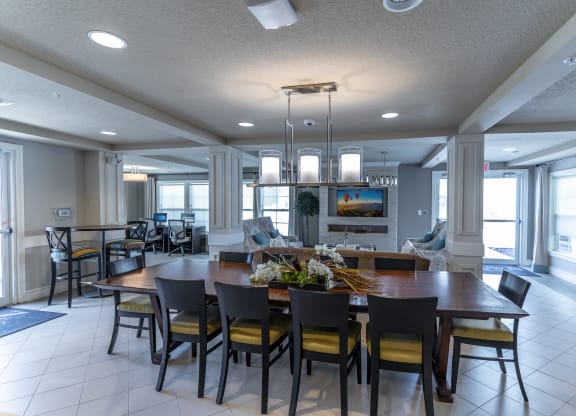 clubhouse with tables and tv