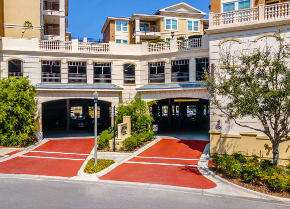 a building with a red walkway in front of it