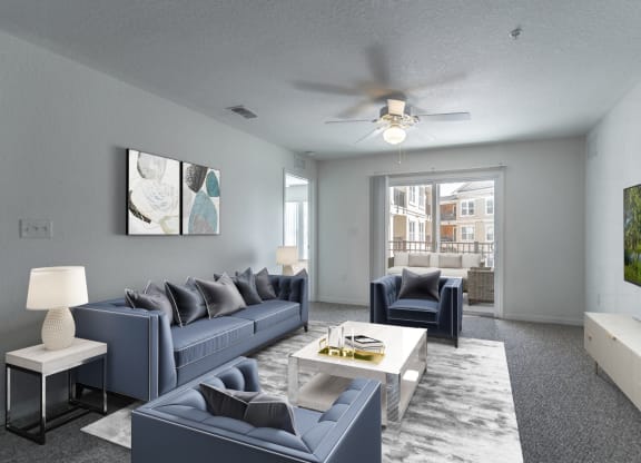a living room with grey couches and a white coffee table