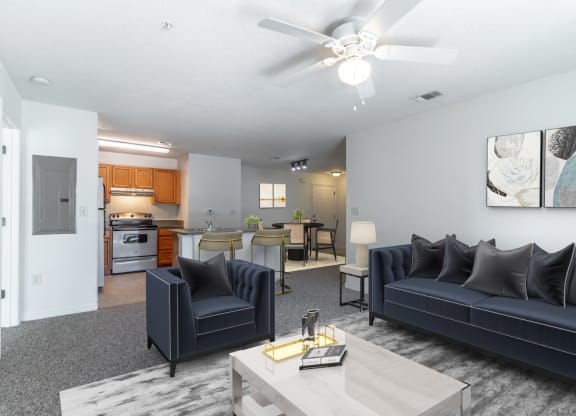 a living room with couches and a coffee table