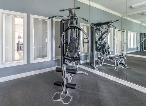 the gym at the enclave at woodbridge apartments in sugar land, tx