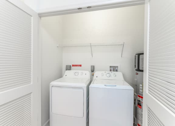 a washer and dryer in the laundry room