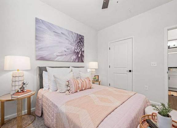 Bedroom with Bed and Nightstand at Giddy Hall Apartments, Charlotte, North Carolina