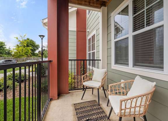 Balcony with Chairs at Giddy Hall Apartments, North Carolina, 28273