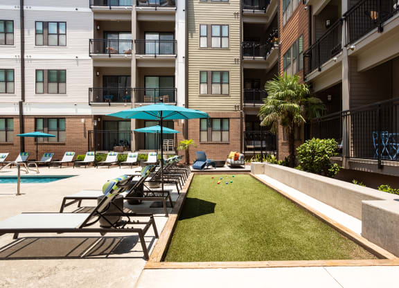 our apartments have a large pool and lounge chairs