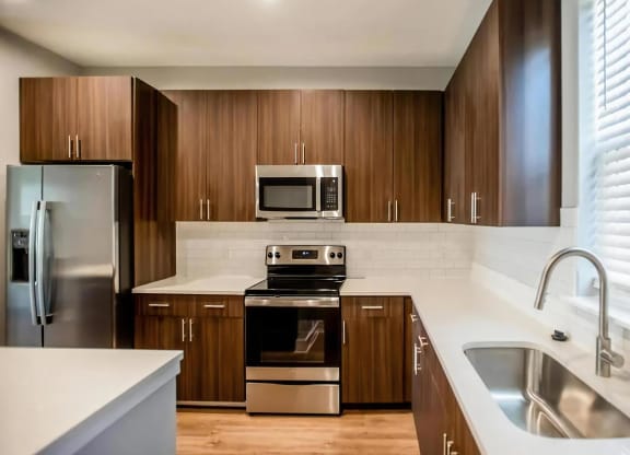 Sleek Kitchen Finishes with Subway Tile Backsplash