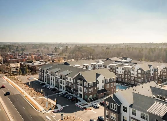 Aerial View of Alta Wren Featuring Modern Community Buildings and Central Pool