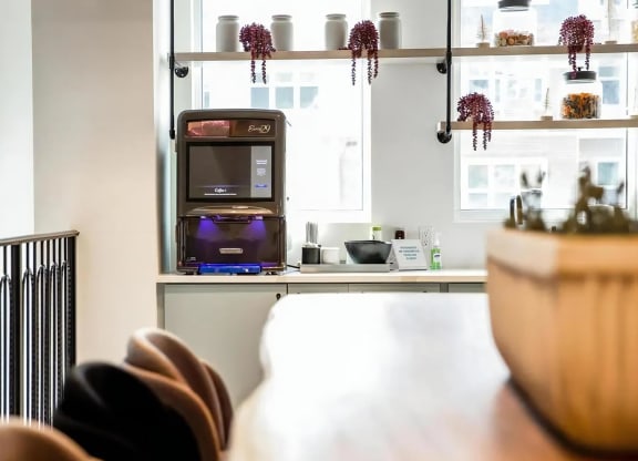 Modern Coffee Station with Sleek Equipment and Decorative Display Jars