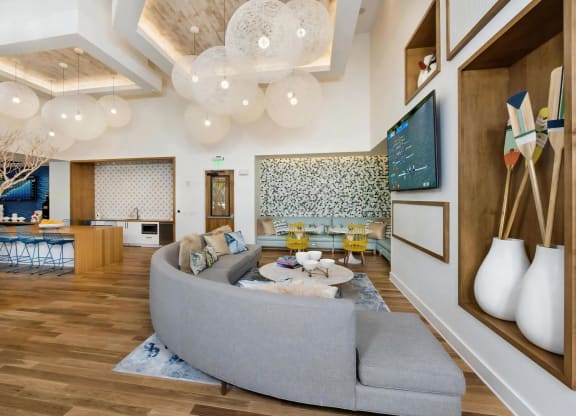 Community Lounge with TV, Kitchenette, and Contemporary Decor Accents