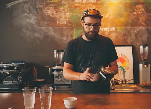 Local Café Barista Making Coffee with Handcrafted Technique