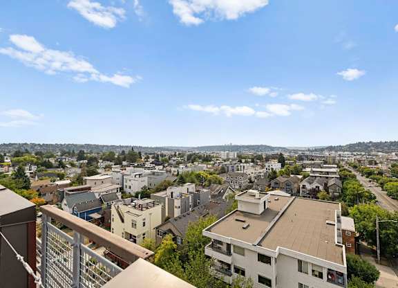 A cityscape with buildings and a clear sky.