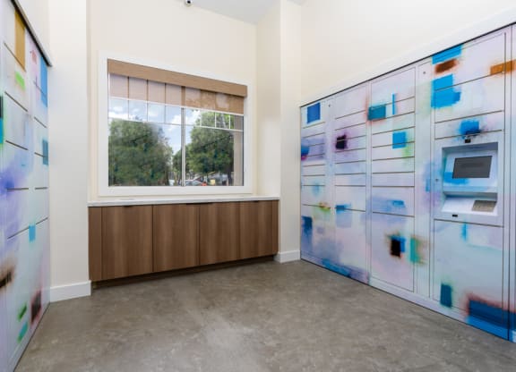 a room with two lockers and a window