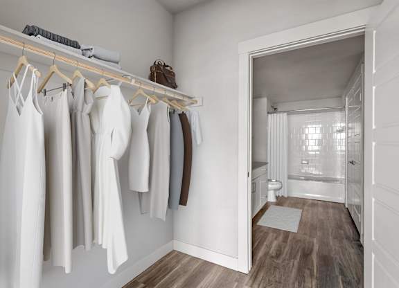 Gateway Arvada Ridge Walk-In Closet with Custom Shelving and Ample Storage Space