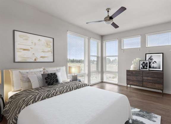 Gateway Arvada Ridge Spacious Bedroom with Natural Light and Ceiling Fan