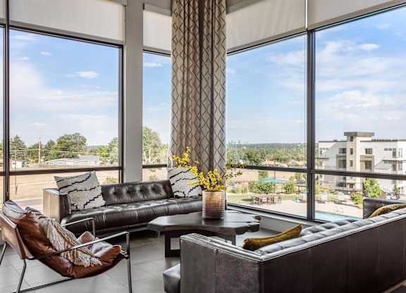 Gateway Arvada Ridge Lounge Area with Panoramic Windows and Modern Seating