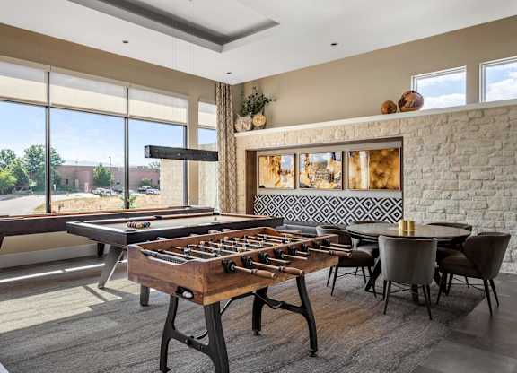 Gateway Arvada Ridge Game Room with Foosball Table and Multiple Seating Areas