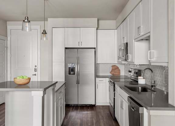 Gateway Arvada Ridge Open Kitchen with Stainless Steel Appliances and Ample Cabinetry