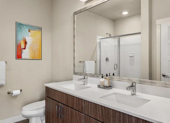 Gateway Arvada Ridge Bathroom with Dual Sink Vanity and Walk-In Shower