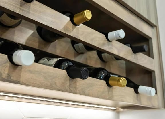 Kitchen Cabinet Featuring Horizontal Wine Bottle Display