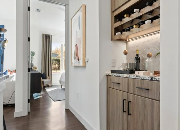 In-Unit Dry Bar with Granite Countertop and Wine Bottle Storage