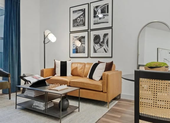 Shared Living and Dining Space with Artwork and Lounge Seating