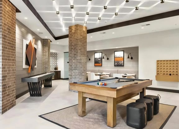 Game Room Featuring Pool Table, Shuffleboard & Lounge Seating
