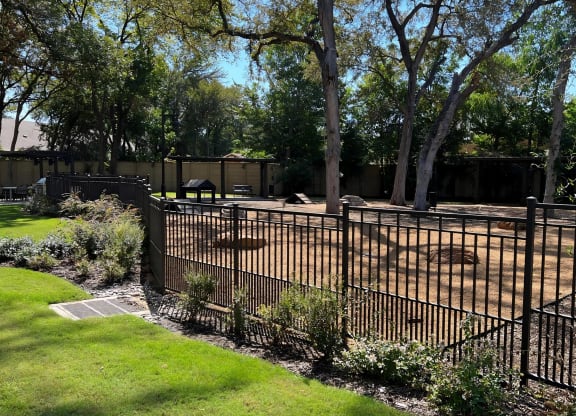 Fenced Dog Park with Obstacle Features and Benches