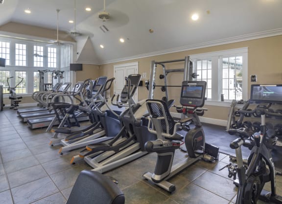 the gym is equipped with state of the art equipment including treadmills and exercise