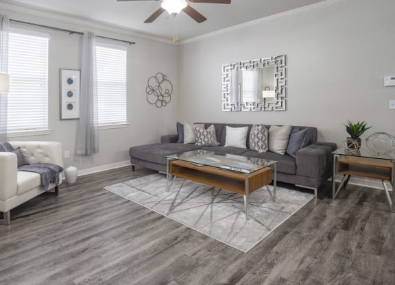 a living room with a couch and a table