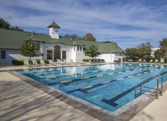 a swimming pool in front of a building