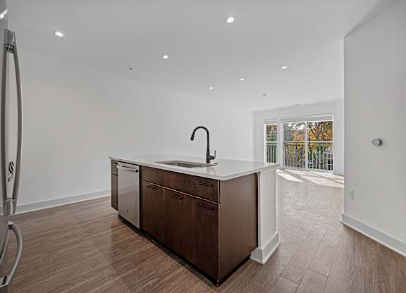 Modern Kitchen with Center Island and Sleek Wood Cabinetry